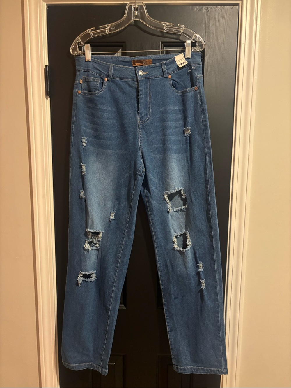 Judy Blue Medium Blue Distressed Boyfriend Jeans. The tag says Large .